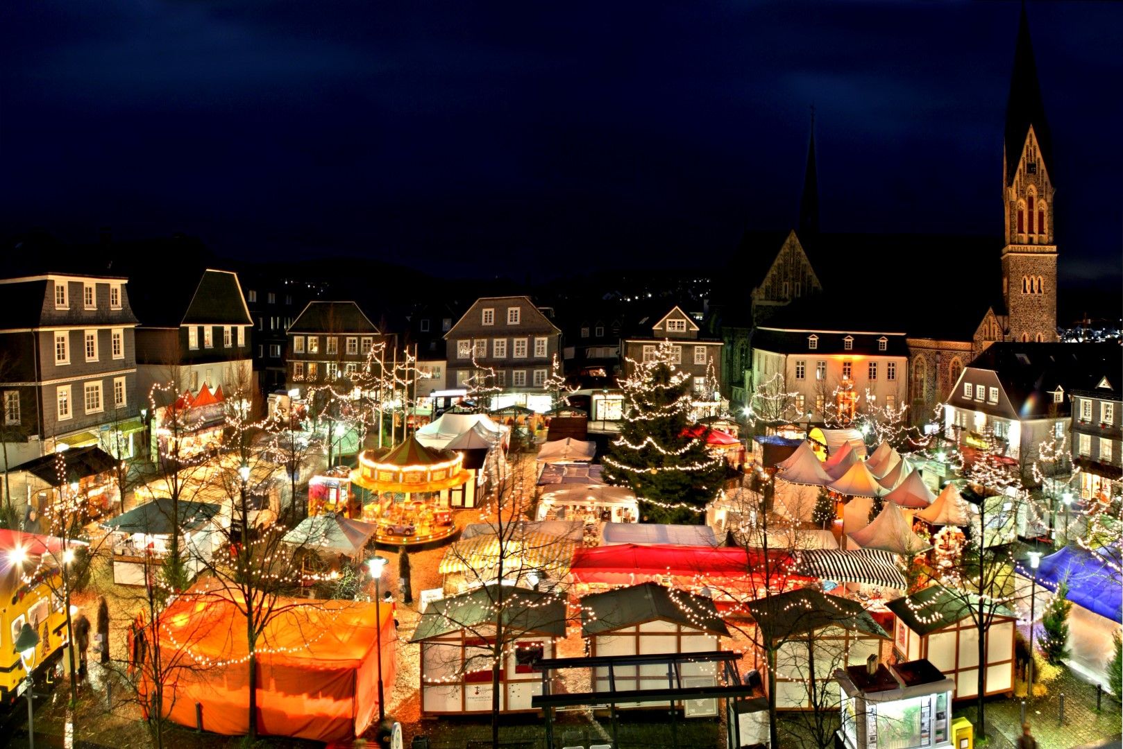 The festively illuminated Christmas market in Olpe enchants the town with its Christmas spirit, especially at night.