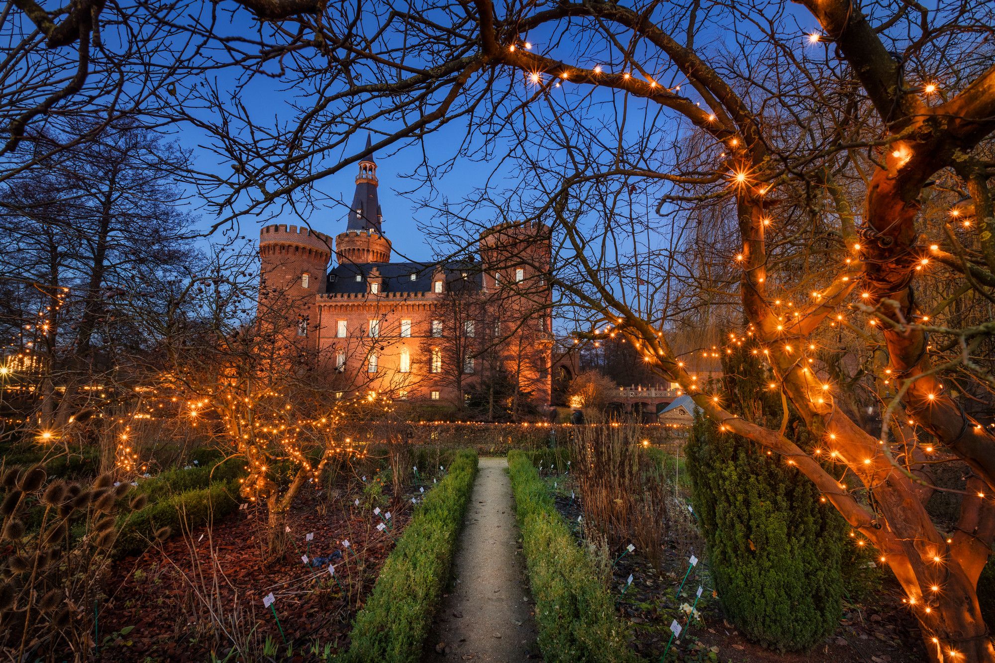 Moyland Castle at night with its fairy lights sets the mood for the wonderful Christmas season.