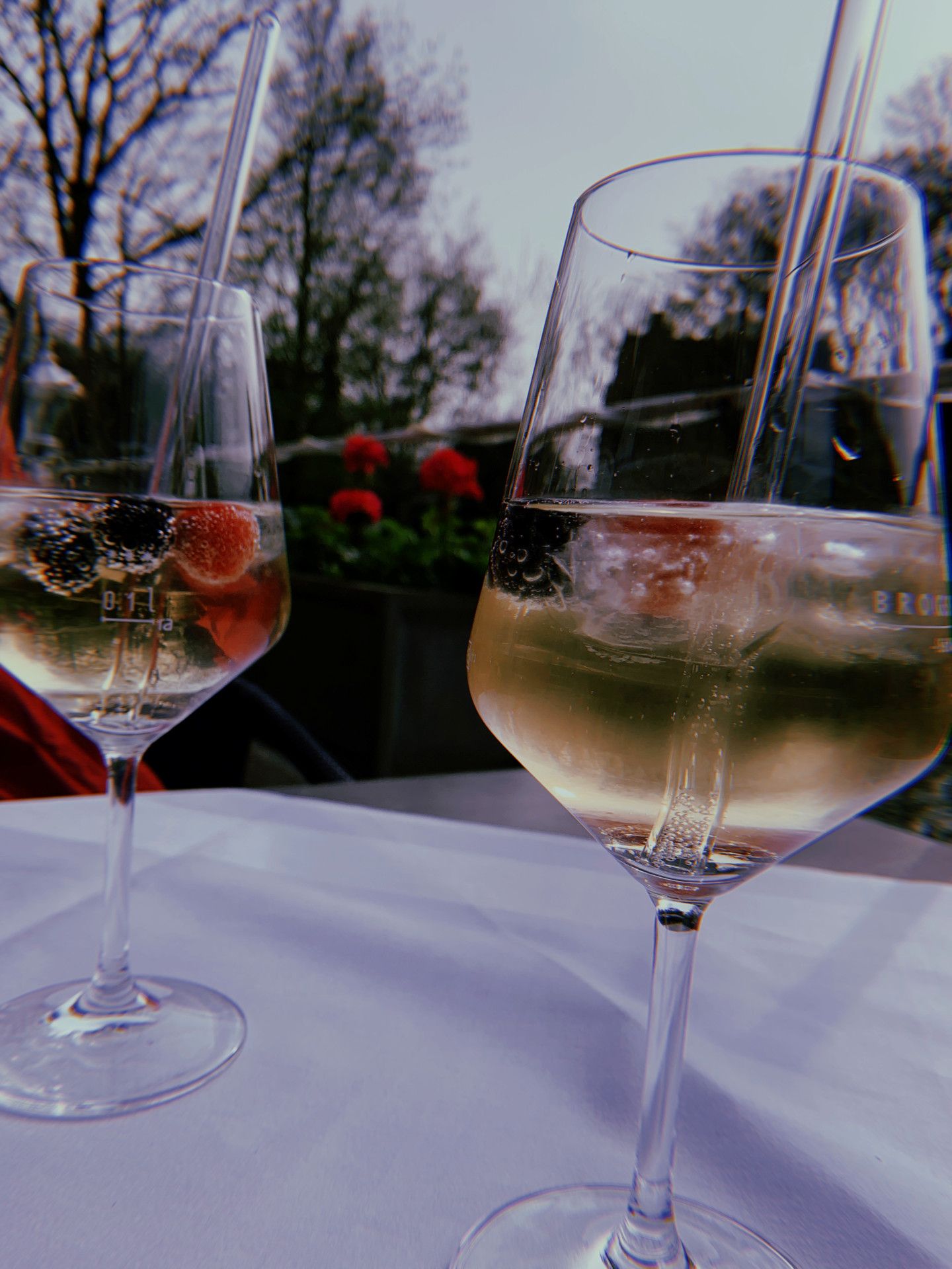 Two glasses filled with Lillet on a table at the Hotel Bedburger Mühle