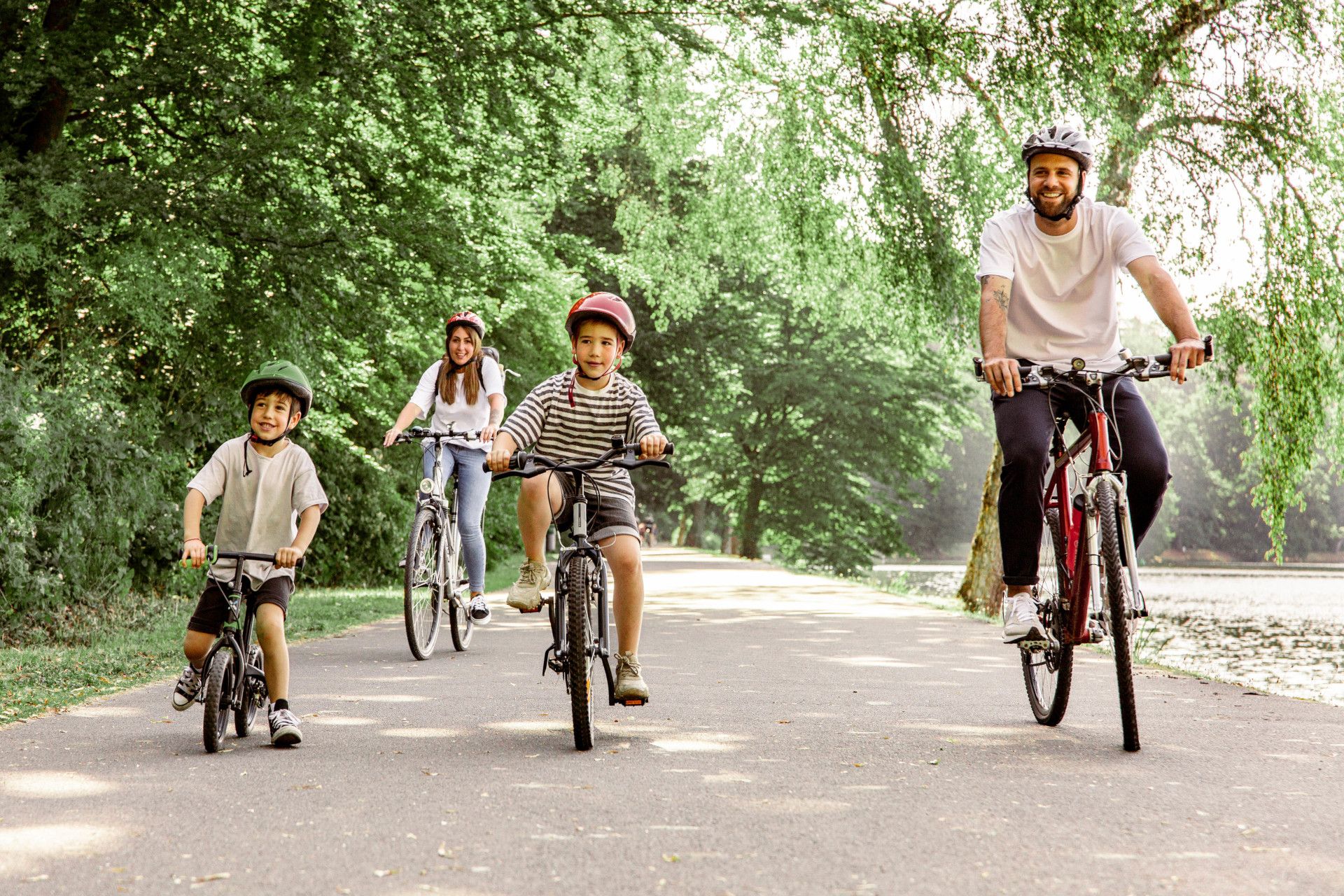 A family cycles together in good weather
