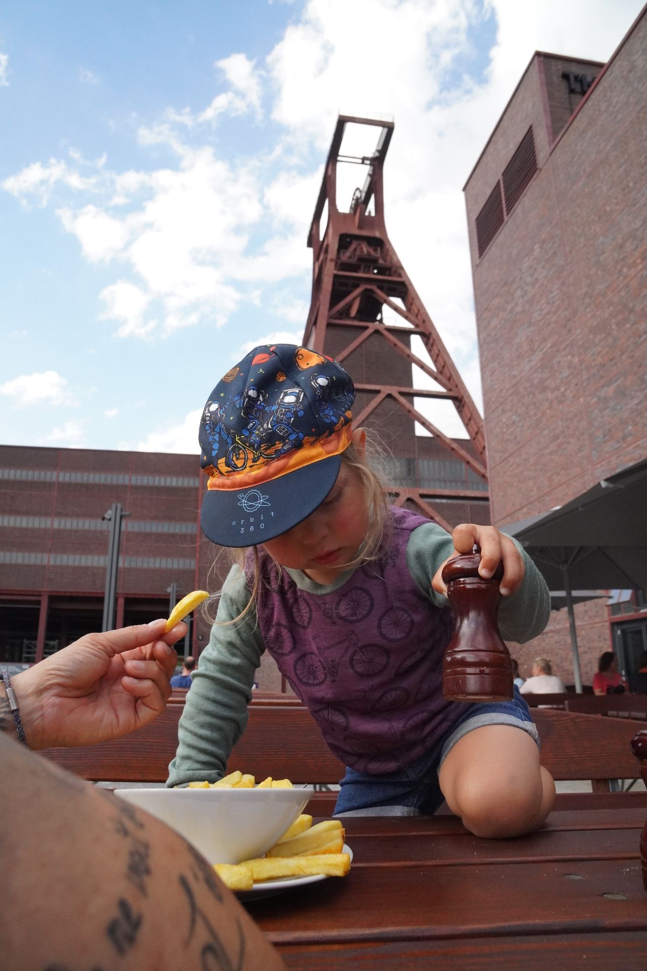 The family takes a break to recharge their batteries at the Zollverein World Heritage Site in Essen