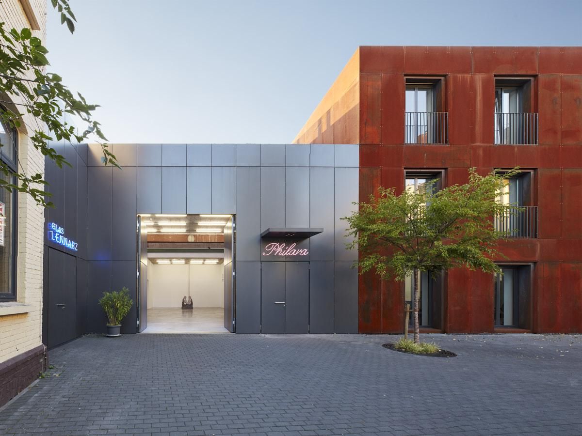 The building that houses the collection has a modern design.