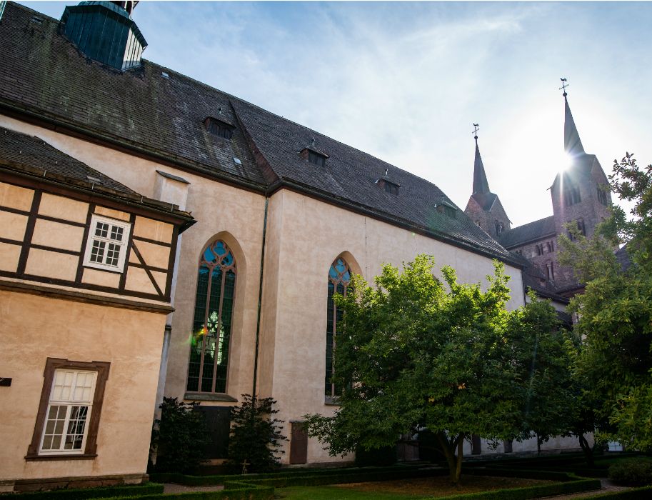 Exterior view of the former monastery church with the westwork and church towers in the background