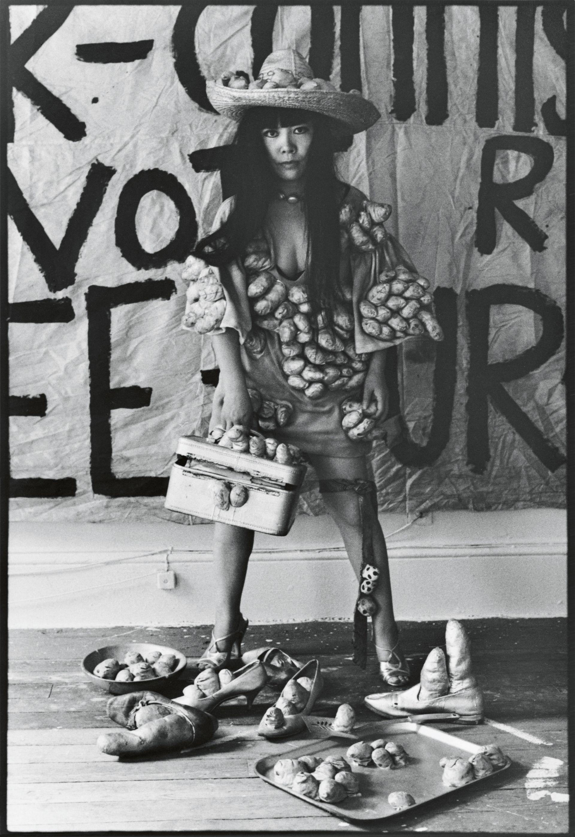 Yayoi Kusama in untitled (dress) with her phallic sculptures in her New York studio, 1971