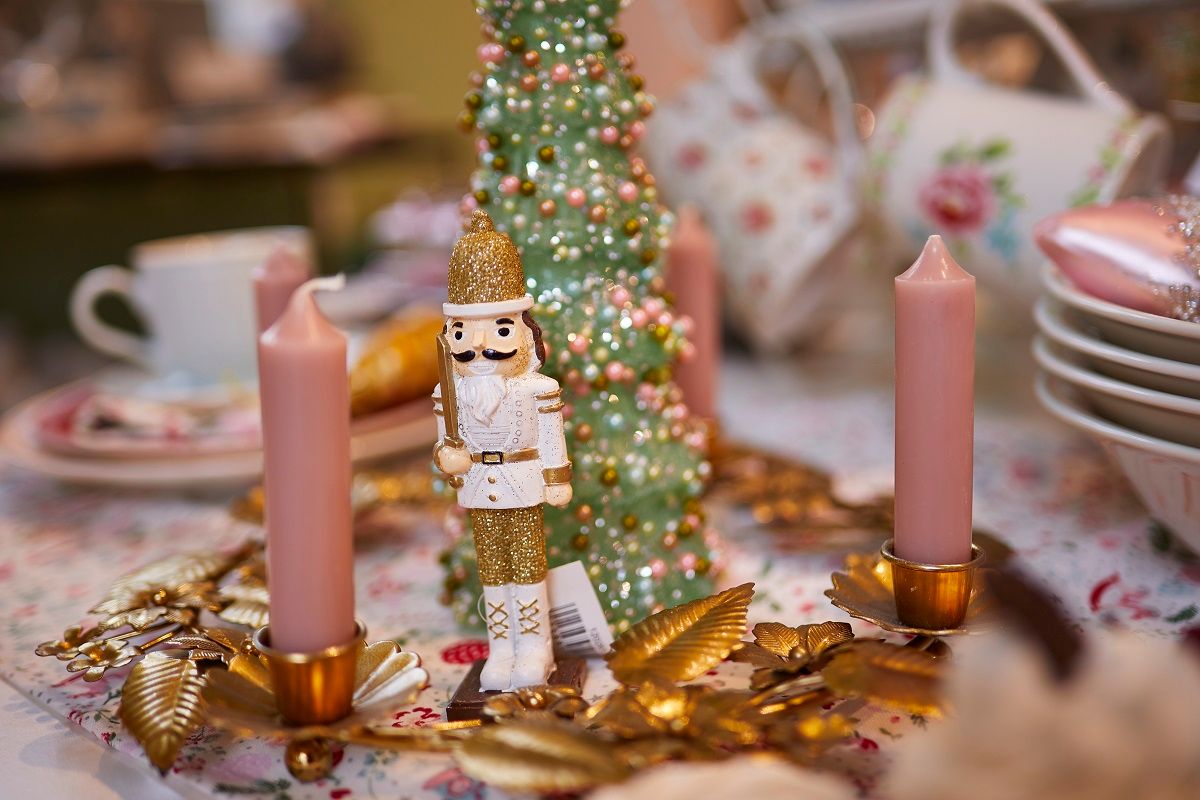 An Advent wreath with Christmas decorations.