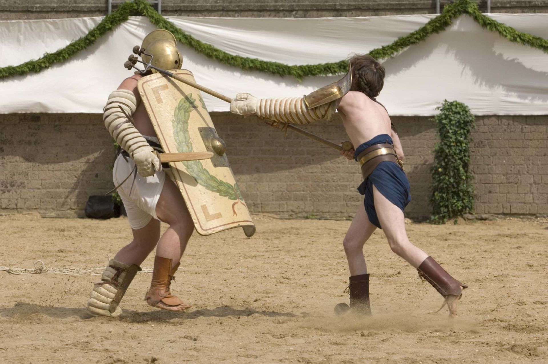 Roman gladiators compete against each other in show fights