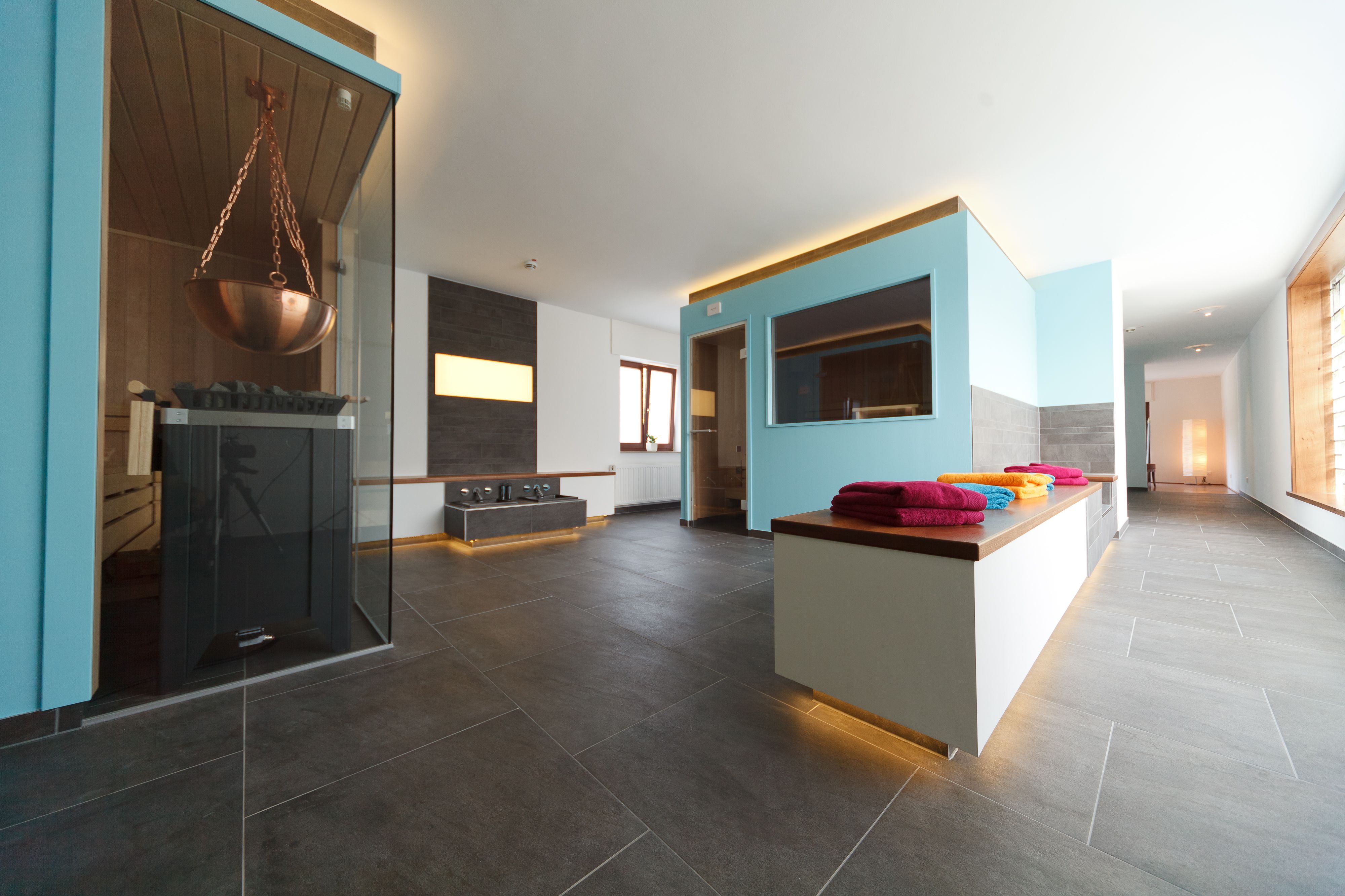 Interior view of the Landhaus Beckmann wellness area in Kalkar with sauna and towels.