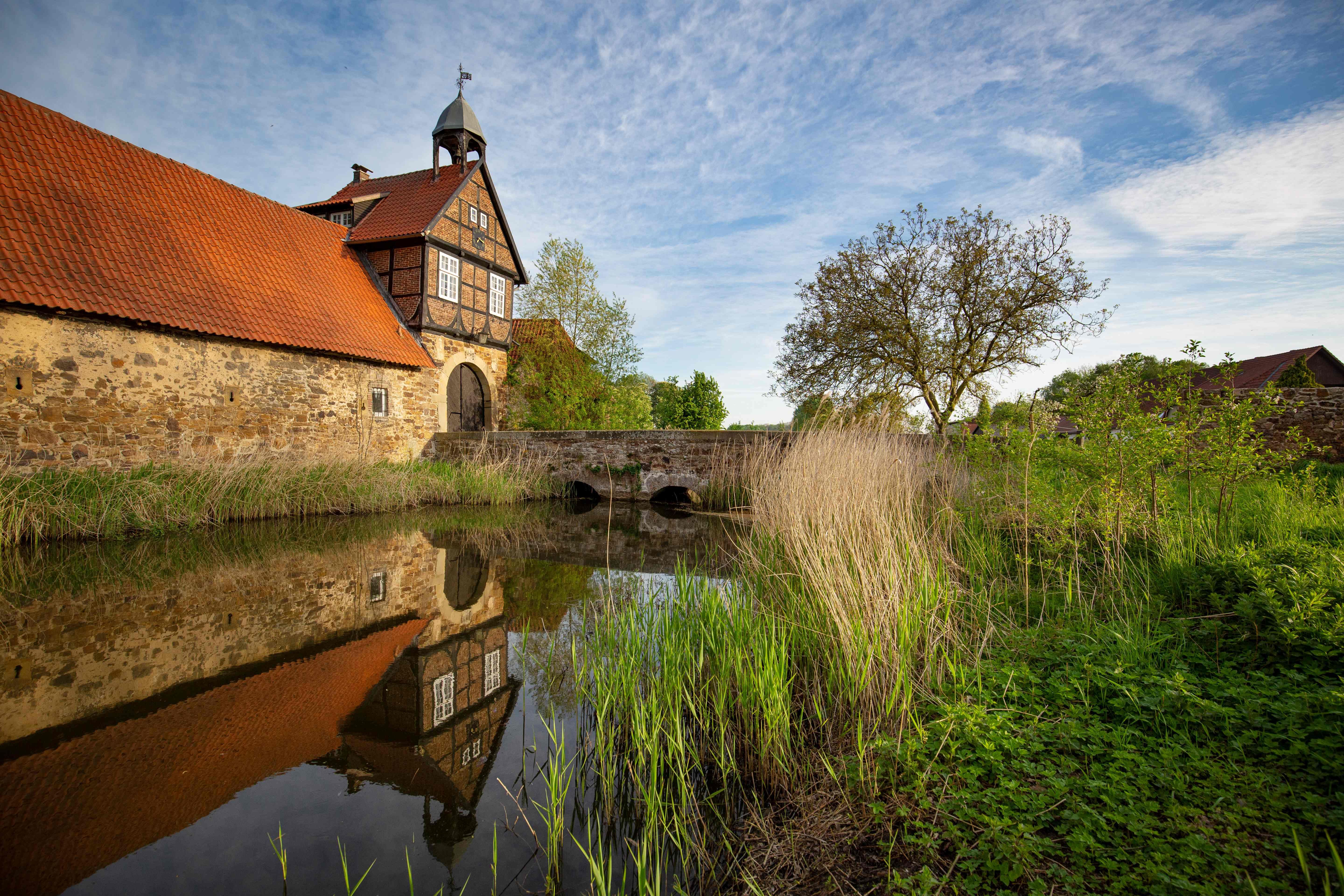 Farm estate reflected in the water